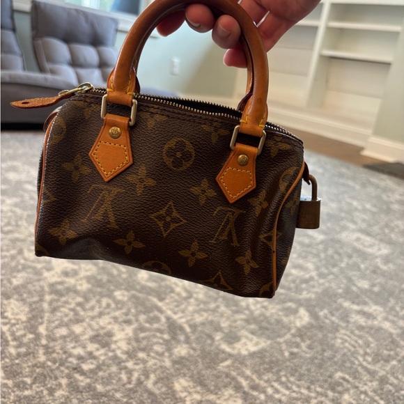 Louis Vuitton Brown and Tan Monogram Handbag - Picture 1 of 4